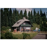 Jubiläumsmodell - Schwarzwaldhaus mit Figur