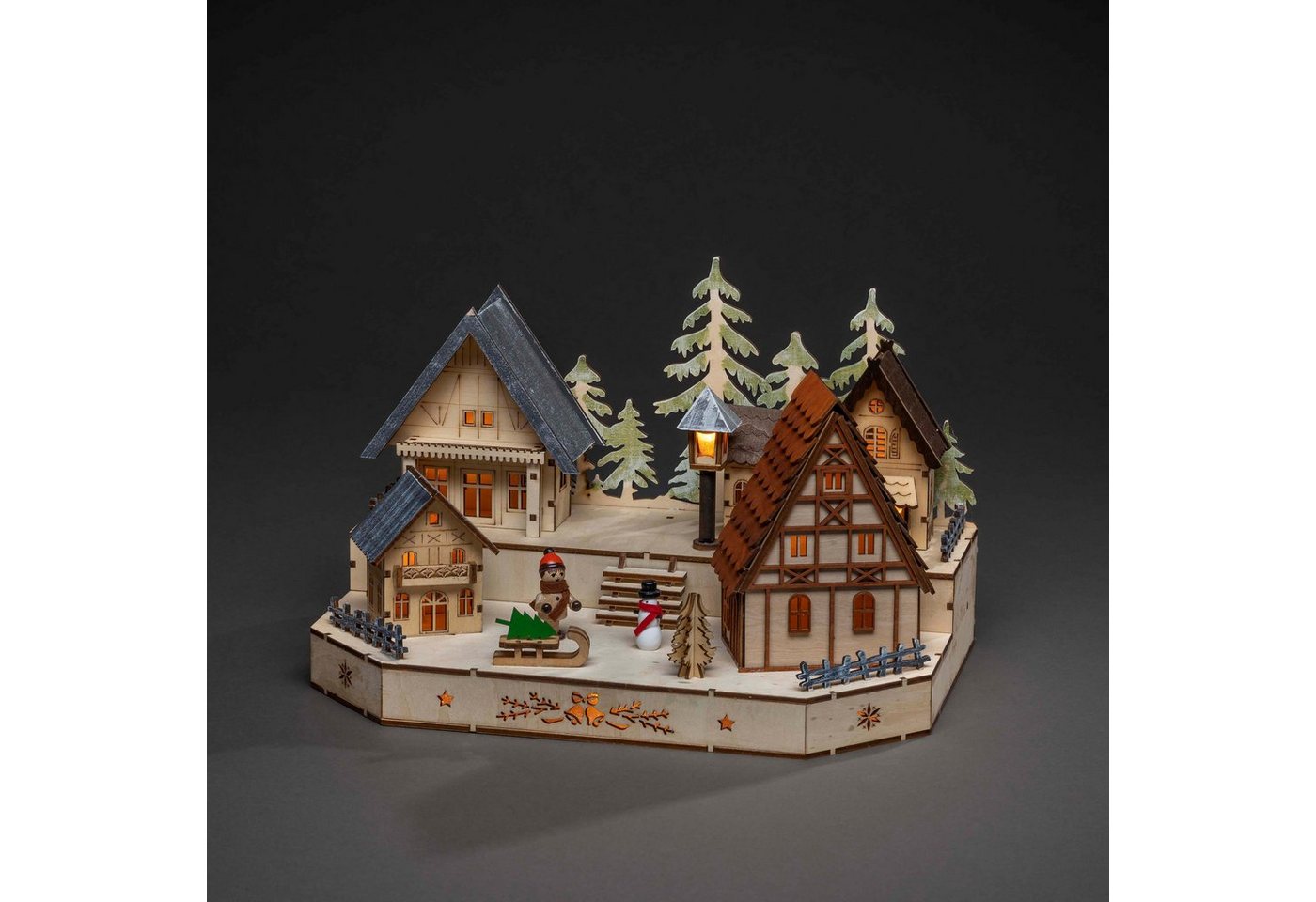 KONSTSMIDE Weihnachtsdorf Weihnachtsdeko, LED Holzsilhouette, Dorf mit Schneemann, Kind und Schlitten – Bild 2 von 4