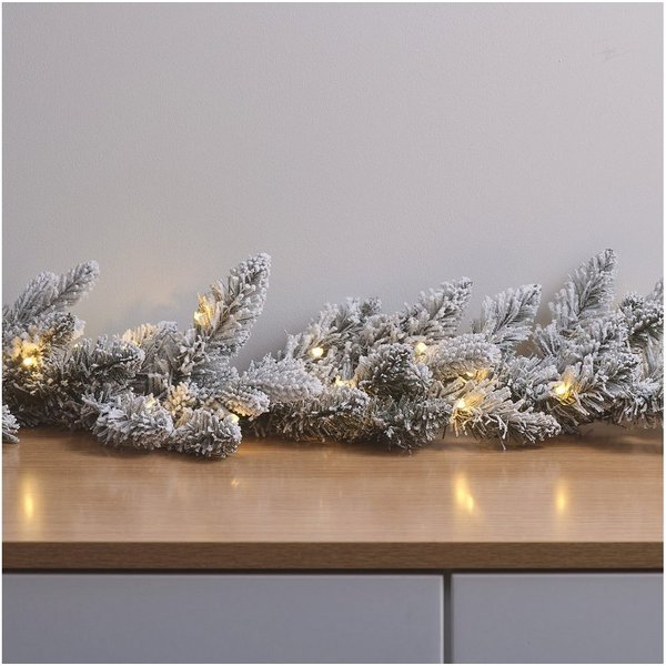 Lights4fun LED-Girlande 1,5m Weihnachtsgirlande mit Schnee beleuchtet