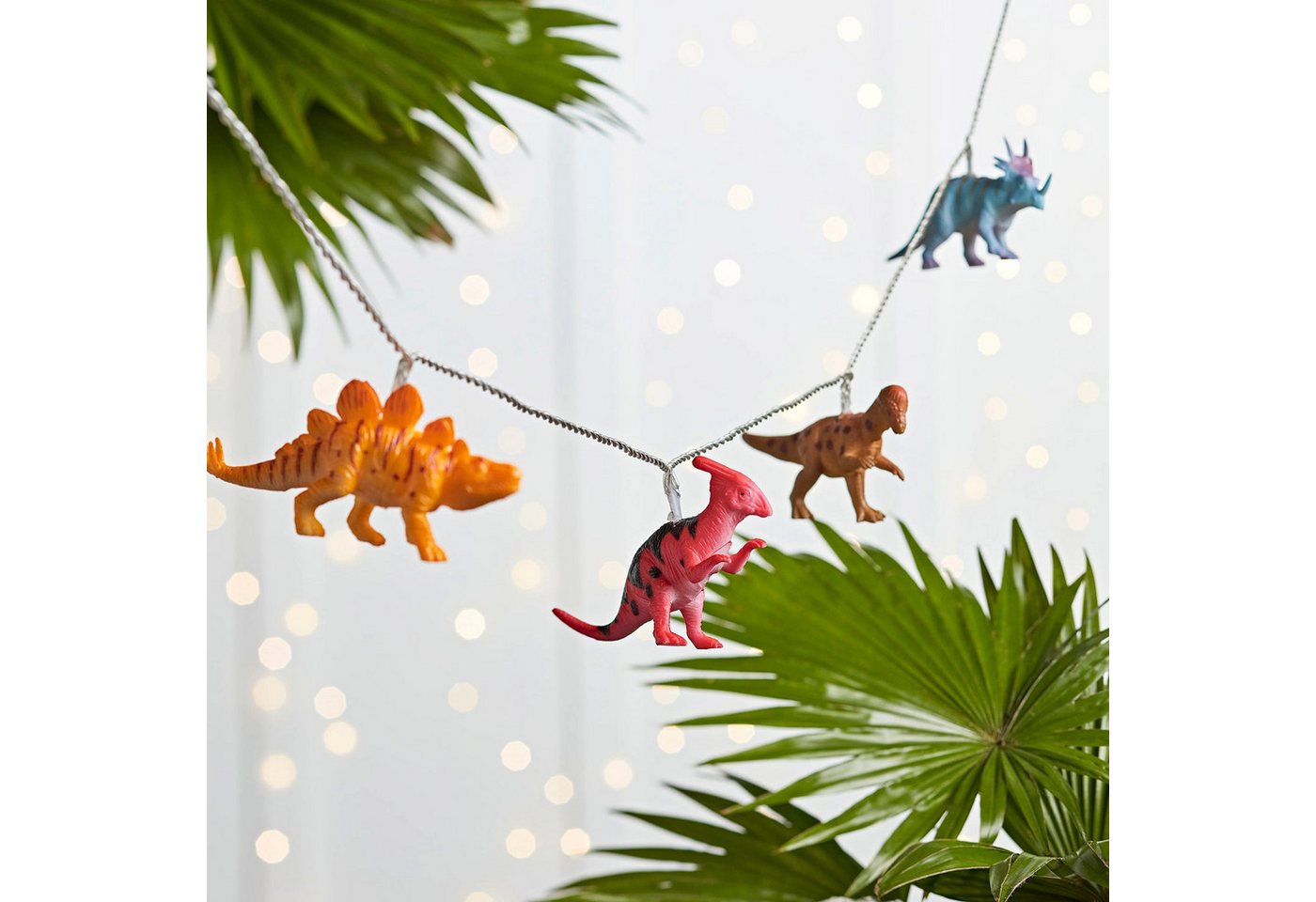 Lights4fun LED-Lichterkette 12er bunte Lichterkette Dinosaurier Batteriebetrieb – Bild 2 von 5