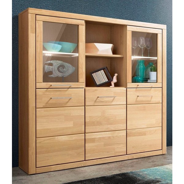 OTTO home Highboard Trondheim,130cm breit,42 cm tief, Fronten Holzmassiv, Metallgriffe, Korpus aus Holzwerkstoff,4 Türen,12 Fächer, Böden teilweise versetzbar